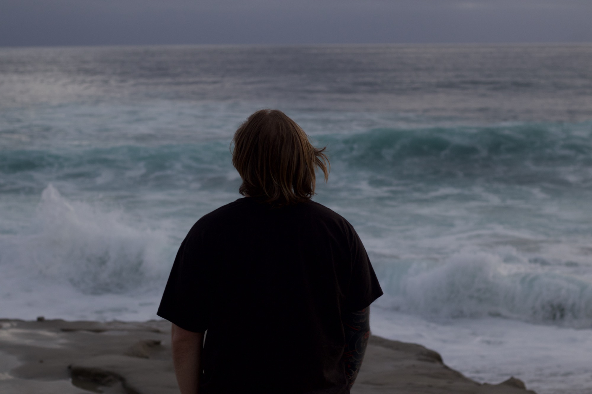 Person at the ocean's edge